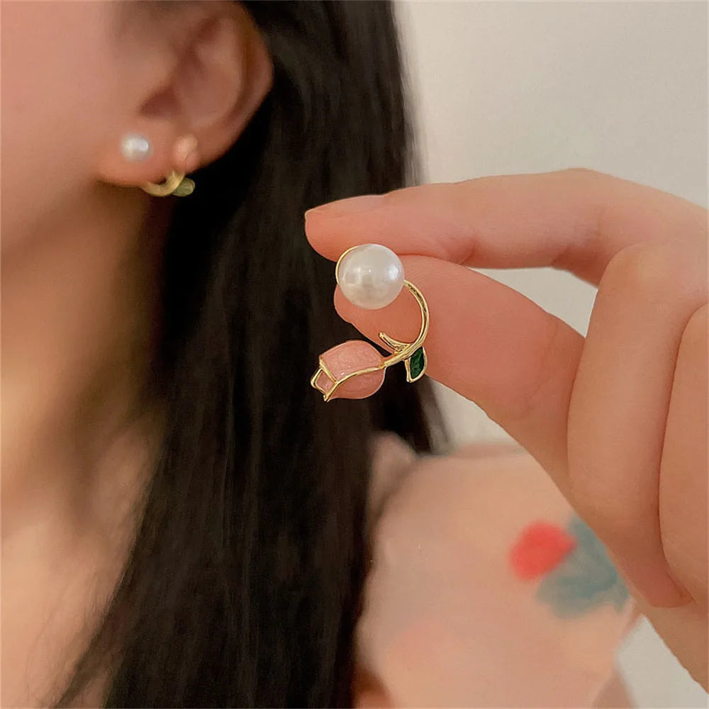 Handmade pearl earrings with sparkling crystals and micro pave.