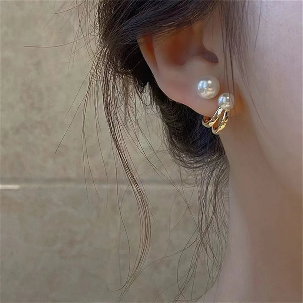 Handmade pearl earrings with sparkling crystals and micro pave.