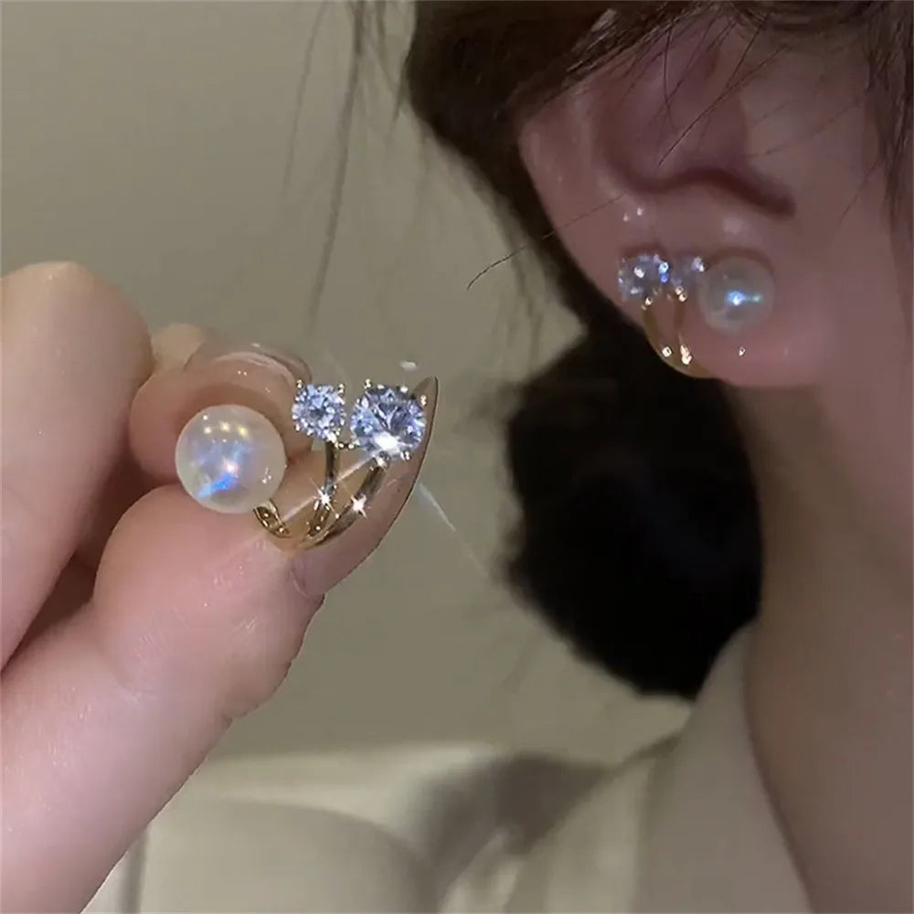 Handmade pearl earrings with sparkling crystals and micro pave.