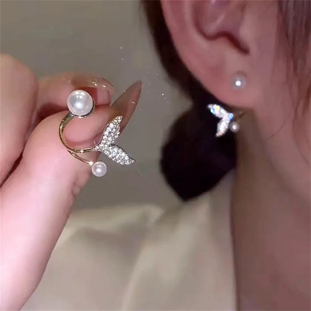 Handmade pearl earrings with sparkling crystals and micro pave.