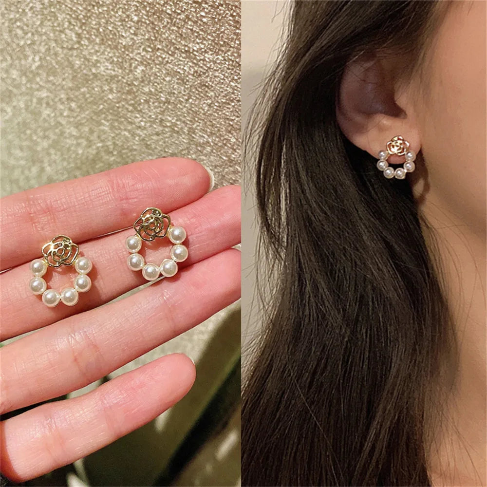 Handmade pearl earrings with sparkling crystals and micro pave.